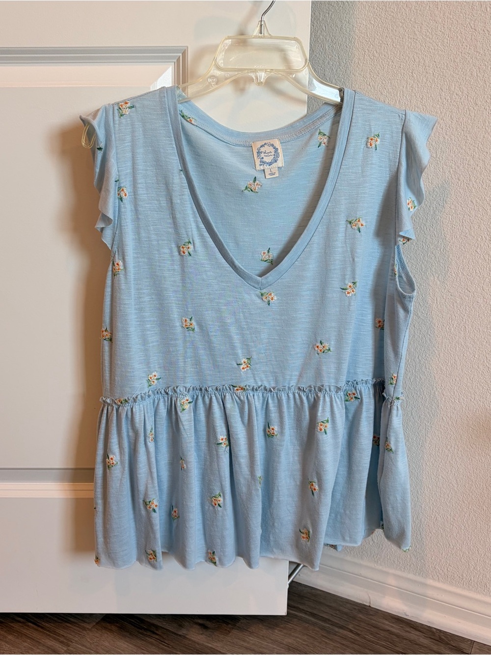 Blue Rain light blue floral embroidered top